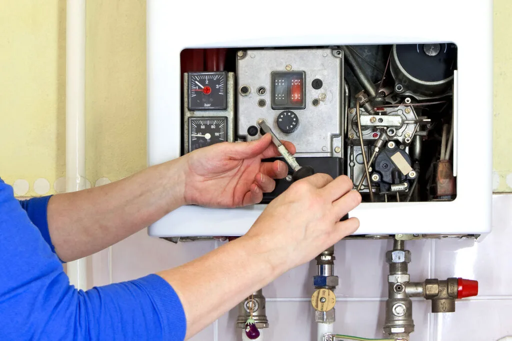 tankless water heater being repaired